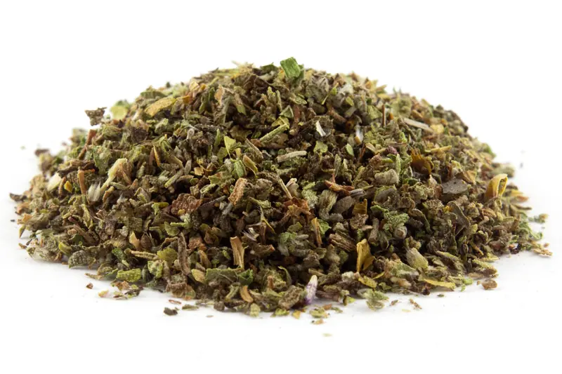 Dried, cut cistus leaves and flowers for infusion, in a small heap